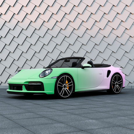 Convertible sports car featuring a TeckWrap matte purple to green gradient vinyl wrap, enhancing its sleek body lines.