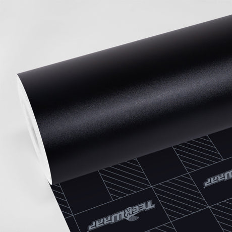 TeckWrap Matte Grainy Black (CM02-MS) Vinyl Wrap roll – premium textured black film for sleek and stealthy vehicle wrap finishes.