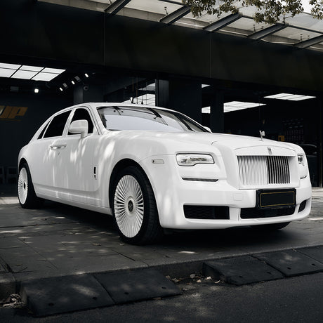 Luxury car fully wrapped in TeckWrap Alaska White SCM02 matte vinyl, demonstrating sleek, elegant, and professional-grade finish
